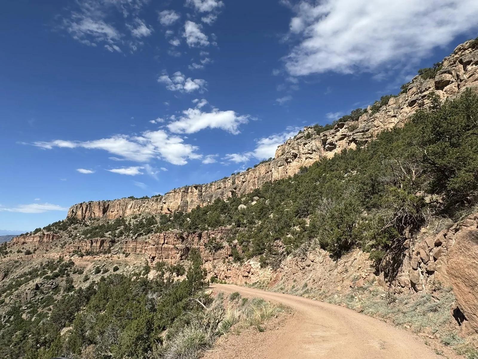 Shelf Road canyon wall and dirt-road shelf view